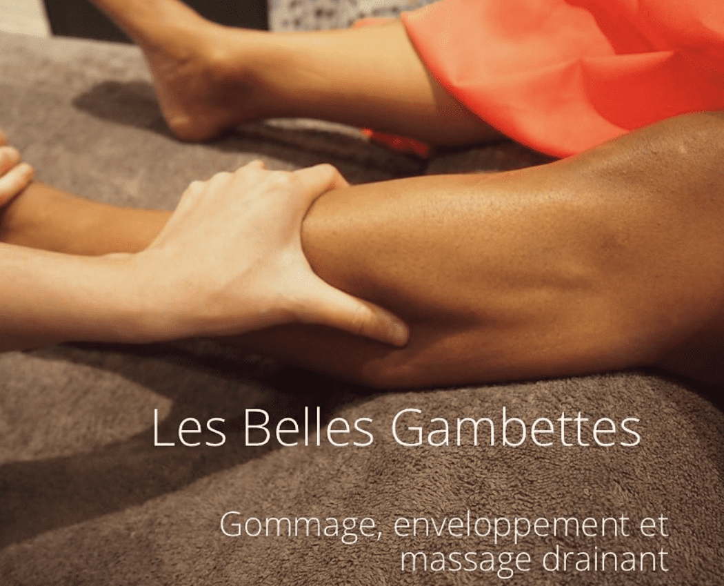 photo d'un massage des jambes d'une femme enceinte